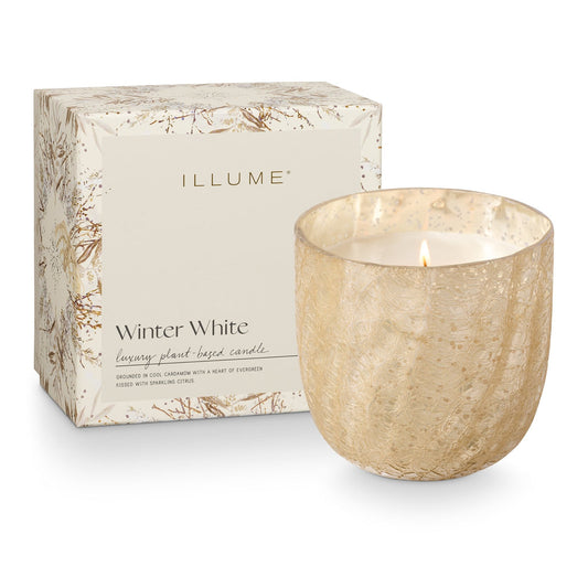 Vela grande de cristal craquelado en caja blanca de invierno